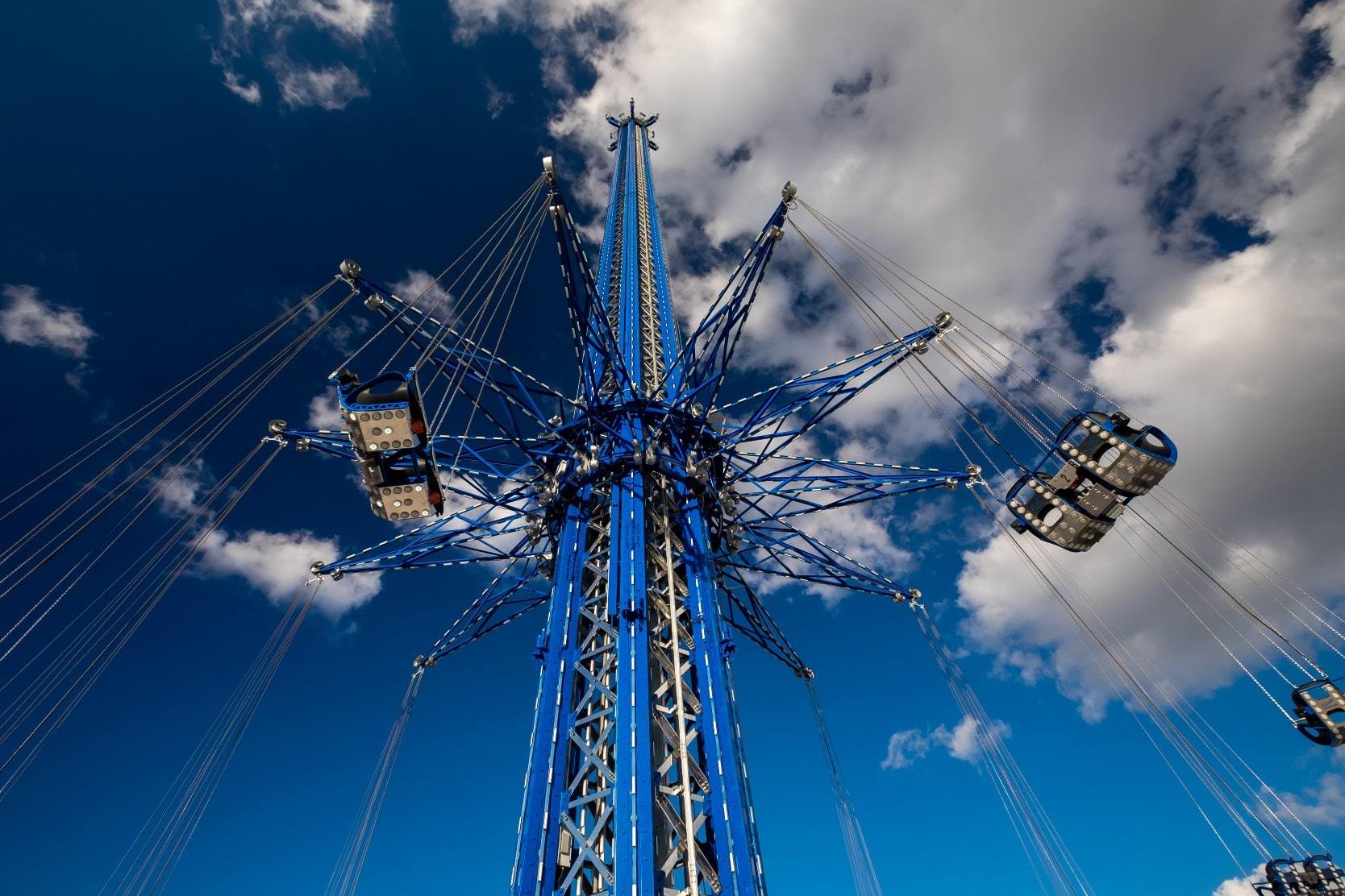 Amusement park ride against a blue sky in Orlando, Florida